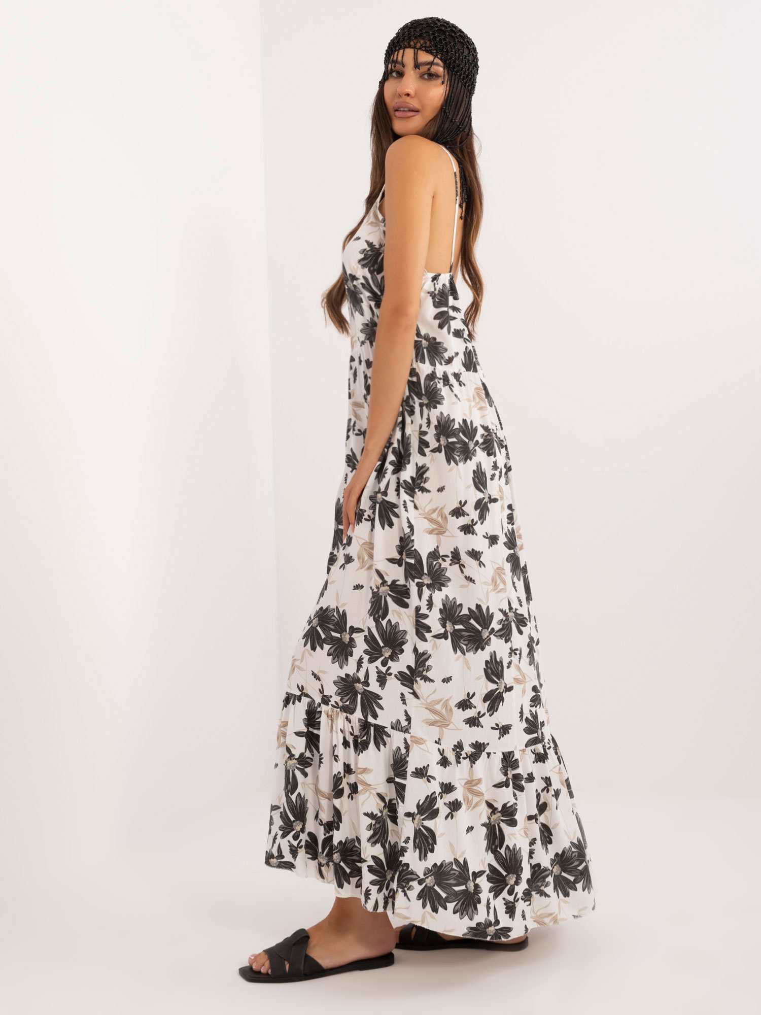 Großhandel Schwarz-weiße lange Kleid mit Rüsche.