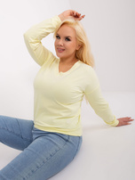 Hurtownia Jasnożółta bluzka plus size z naszywką 