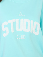 Miętowa bluza oversize z wypukłym napisem