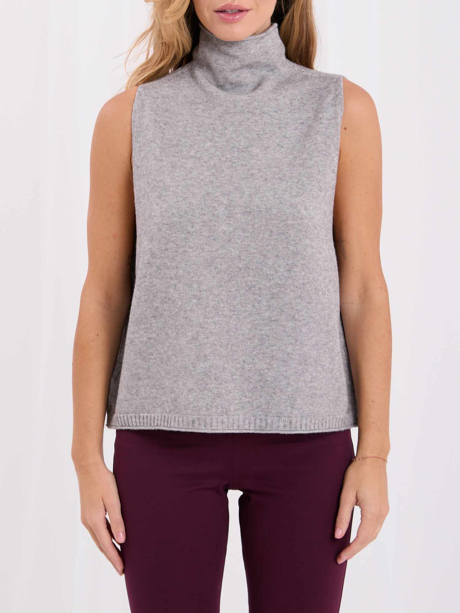 Gray sweater top with a mock turtleneck.