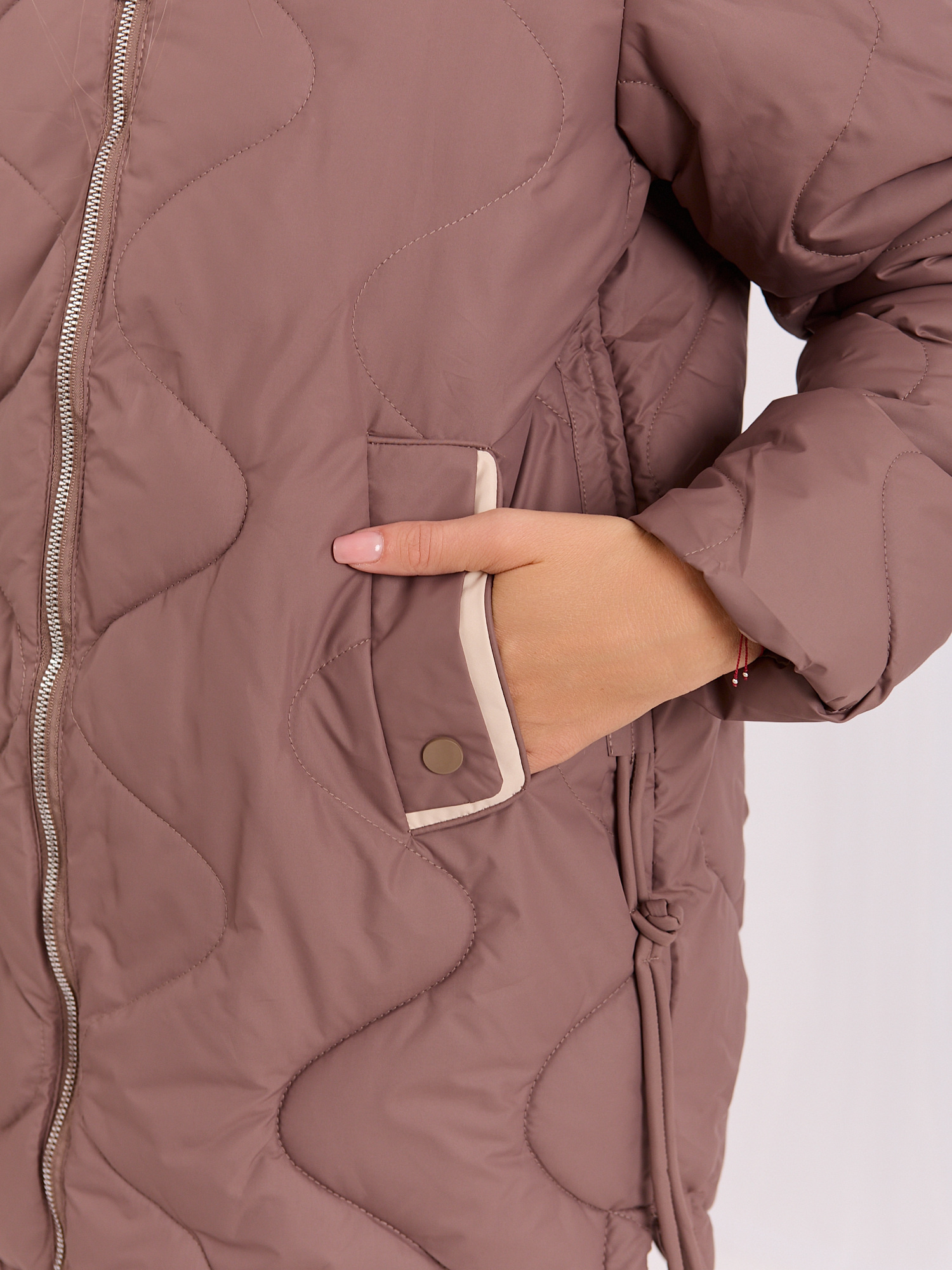 Hurt braune gesteppte Übergangsjacke mit Kapuze.