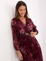 Burgundy pleated dress with a belt.