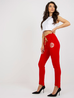 Hurtownia Czerwone damskie spodnie dresowe z nadrukiem