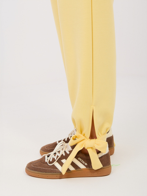 Jasnożółte dresowe spodnie z kieszeniami