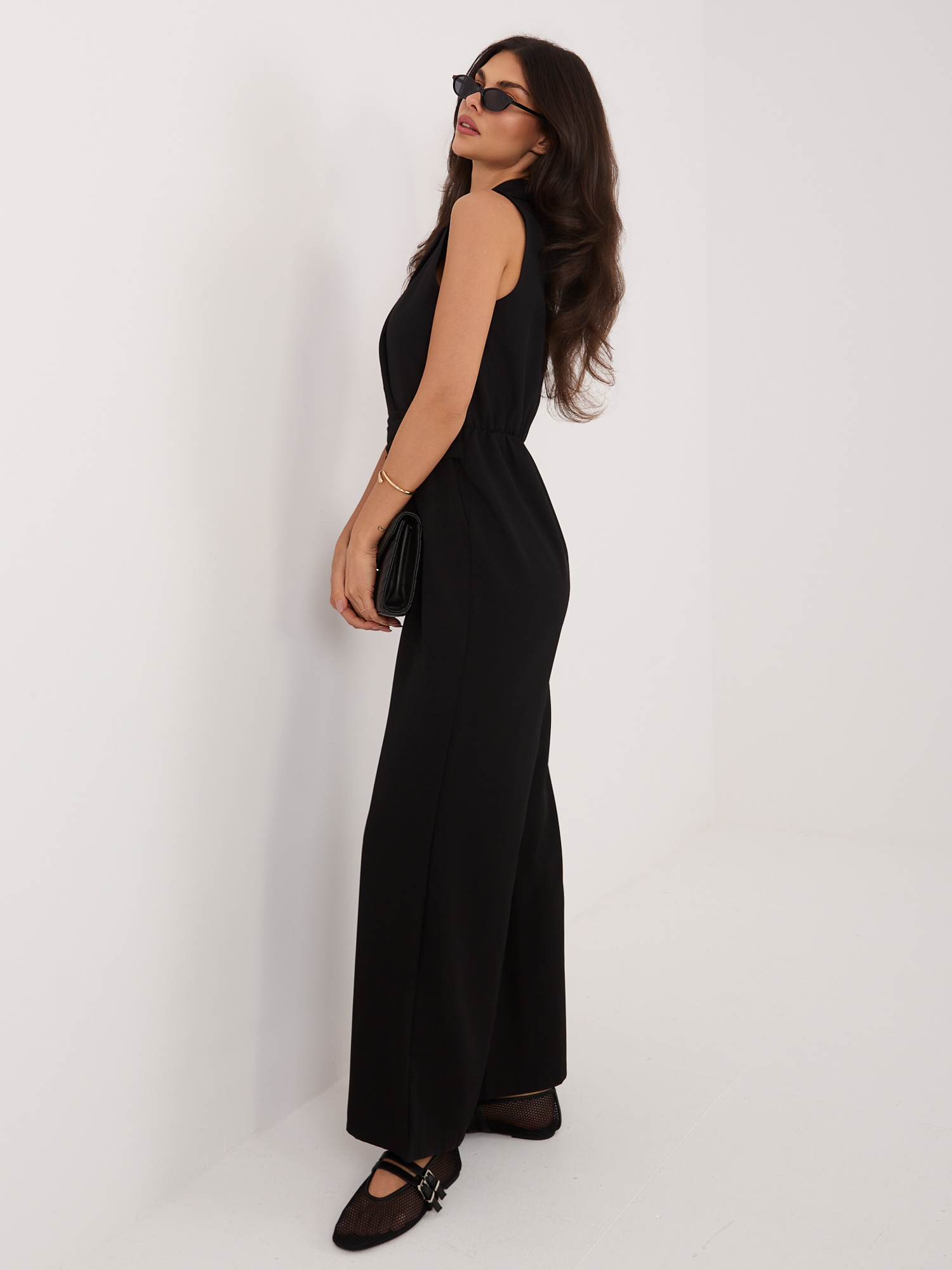 Black elegant sleeveless jumpsuit.