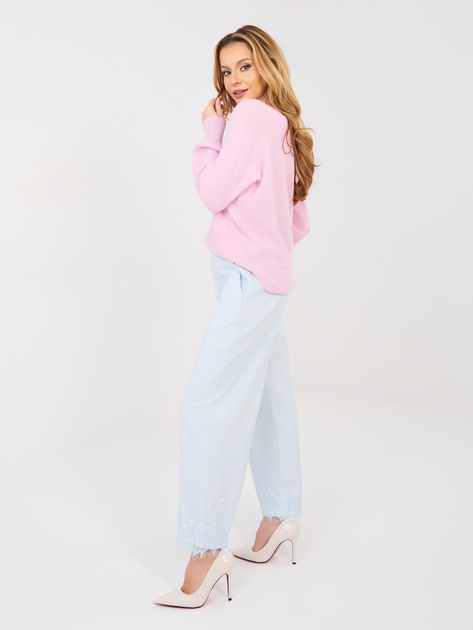 Jasnoniebieskie damskie jeansy z kieszeniami RUE PARIS