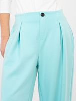 Miętowe dresowe spodnie z zakładkami