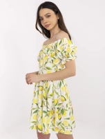 Ecru-yellow off-the-shoulder dress with lemons.