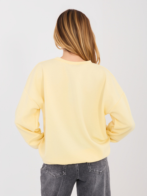 Pastelowa żółta bluza z kontrastowym napisem RUE PARIS