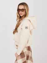 Jasnobeżowa kurtka z kwiatowym pikowaniem RUE PARIS 