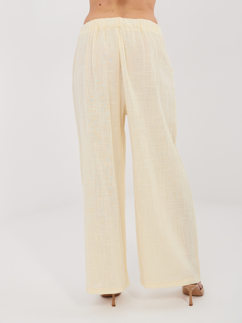 Jasnożółte szerokie spodnie na lato
