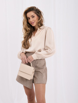 Light beige elegant blouse with a satin effect.