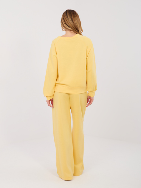 Pastelowy żółty komplet z szerokimi spodniami