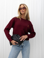 Burgundy short sweater with a cable knit.