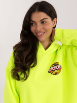 Fluo žlutá zateplená mikina s potiskem.