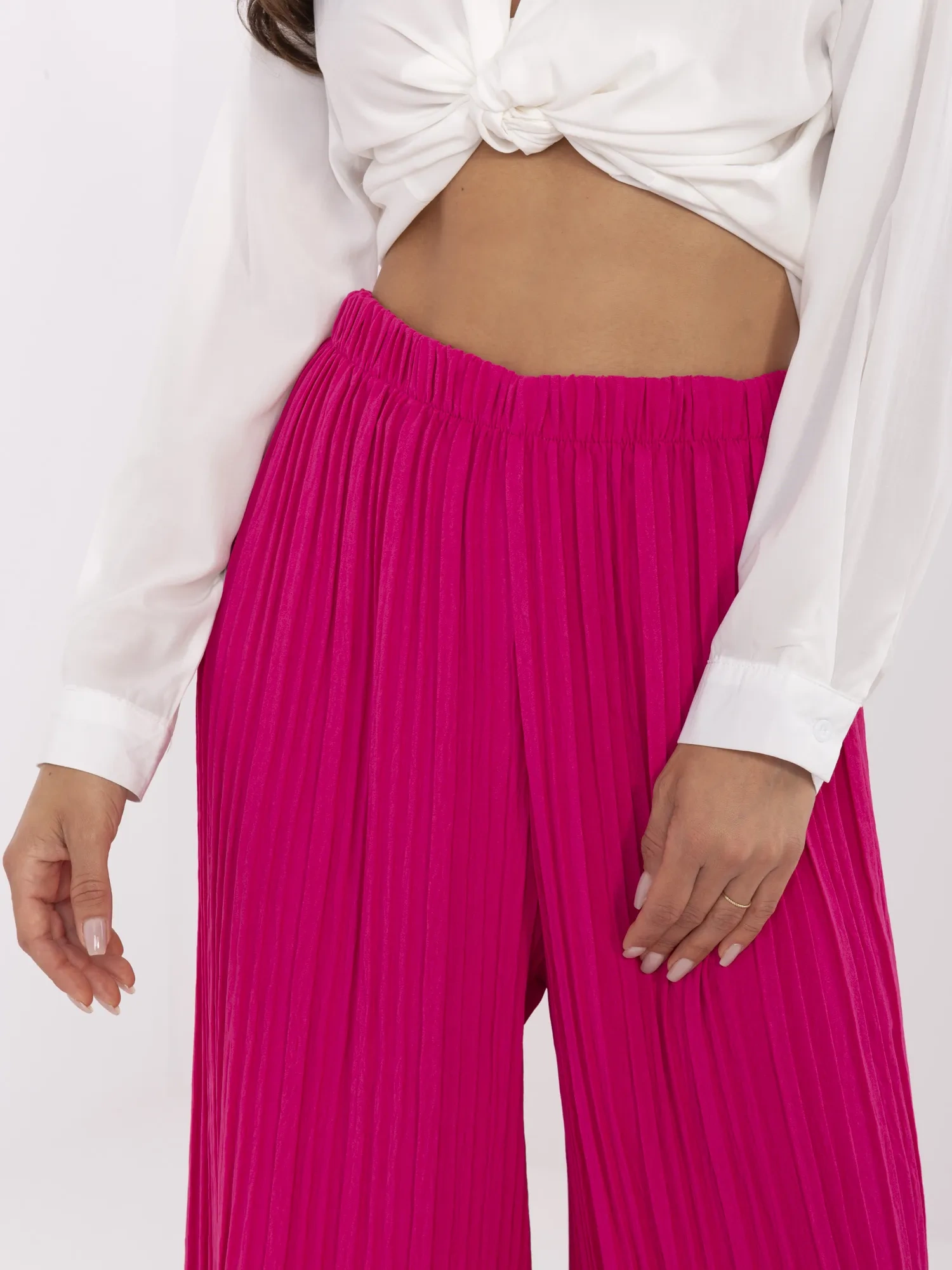 Fuchsia structural pants with an elastic waistband.
