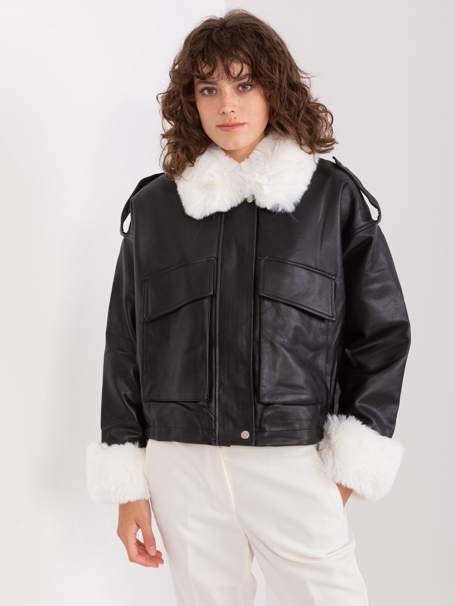 Hurt Black and white winter jacket with decorative fur.