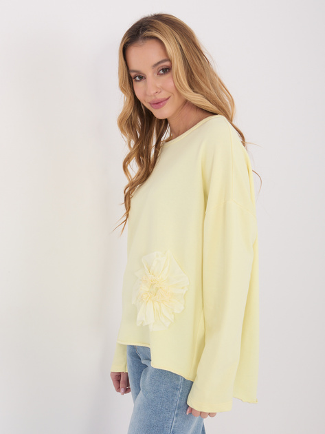 Jasnożółta bluza z kwiatową aplikacją
