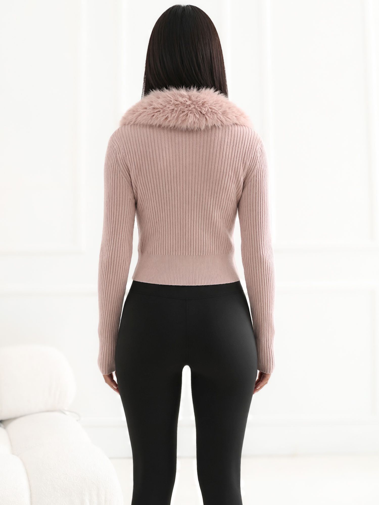 Light pink ribbed sweater with fur.