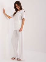 Hurt White casual set with a blouse and straight pants.