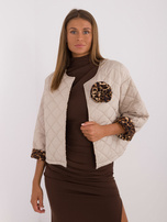 Hurt Beige Übergangsjacke mit Futter im Leopardenmuster.