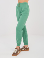 Pistacjowe ocieplane spodnie basic z kieszeniami