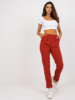 Hurt Ciemnopomarańczowe wełniane spodnie z materiału od garnituru