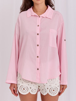Helle rosa Baumwollbluse mit Reißverschluss.
