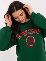 Hurtownia Ciemnozielona bluza bez kaptura z naszywkami