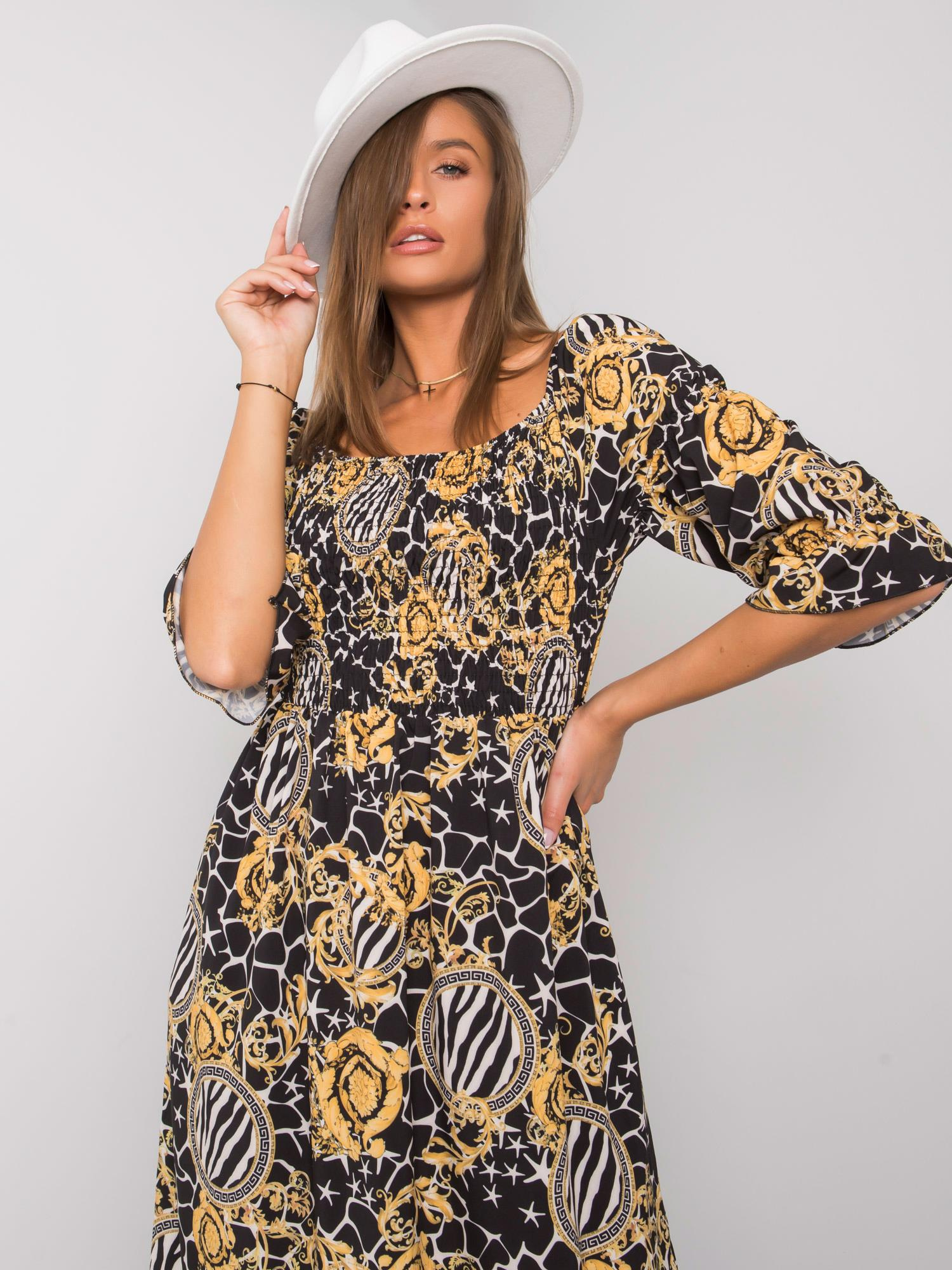 Black and yellow patterned dress by Bevelyn