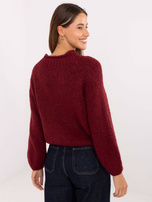 Burgundy oversized sweater in solid color.