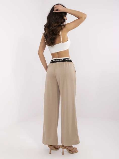 Ciemnobeżowe dresowe spodnie z szeroką nogawką