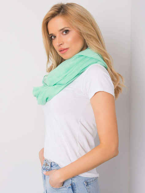 Zielony komin z błyszczącą aplikacją