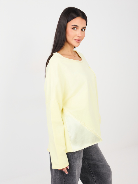 Jasnożółta bluzka overssize z wstawkami z satyny