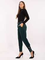 Ciemnozielone dresowe spodnie z długimi ściągaczami