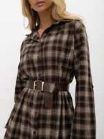Brown checkered shirt dress with a belt.