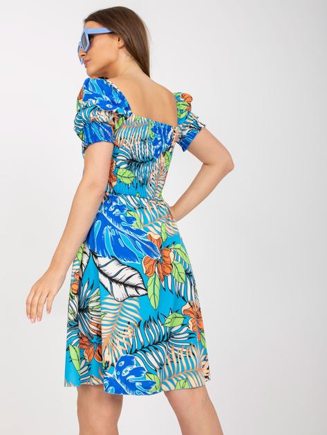 Niebieska letnia sukienka z printami i wiązaniem