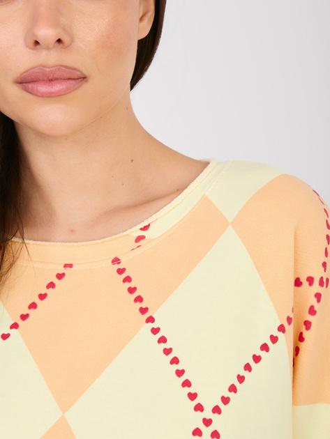 Jasnożółto-pomarańczowa bluza oversize bez kaptura