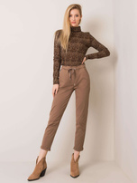 Carrie's dark beige pants