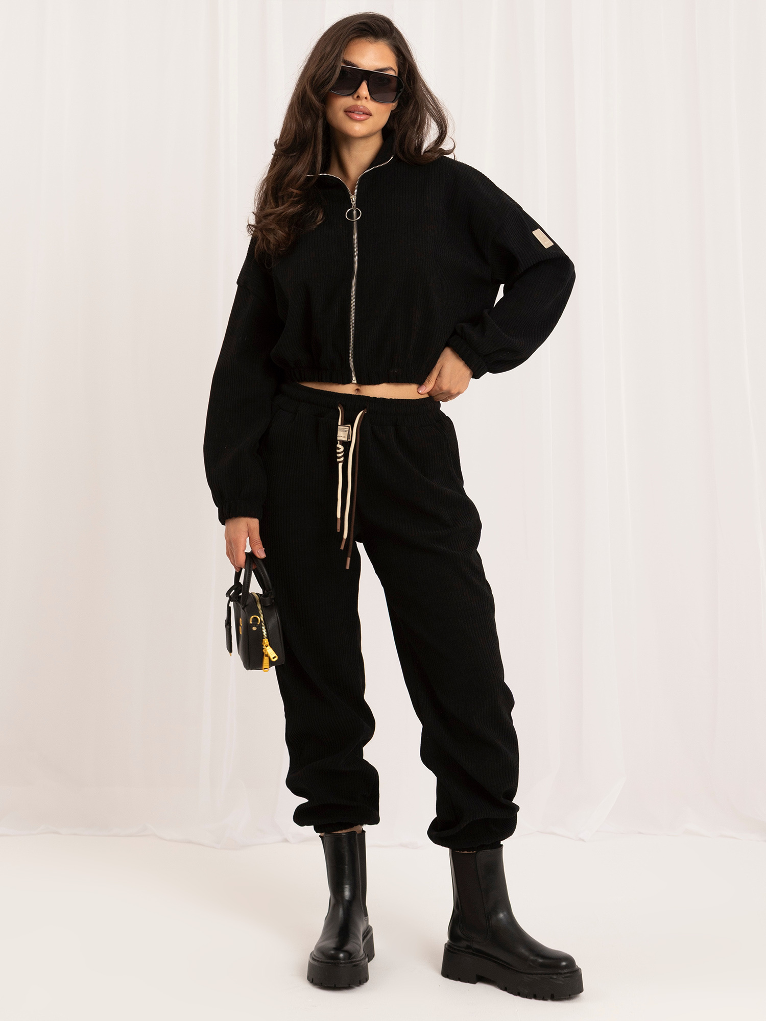 Black corduroy set with jogger pants.