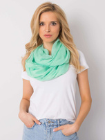 Zielony komin z błyszczącą aplikacją