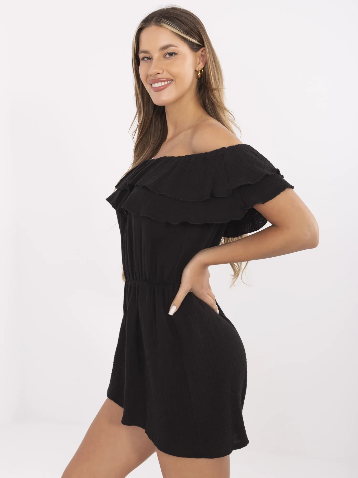 Black muslin jumpsuit with shorts.