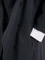 Graphite women's oversized coat with a high collar.