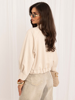 Light beige women's napoleon jacket with a collar.