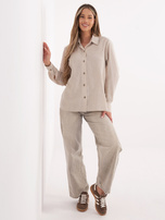 Beige women's shirt with a longer back.