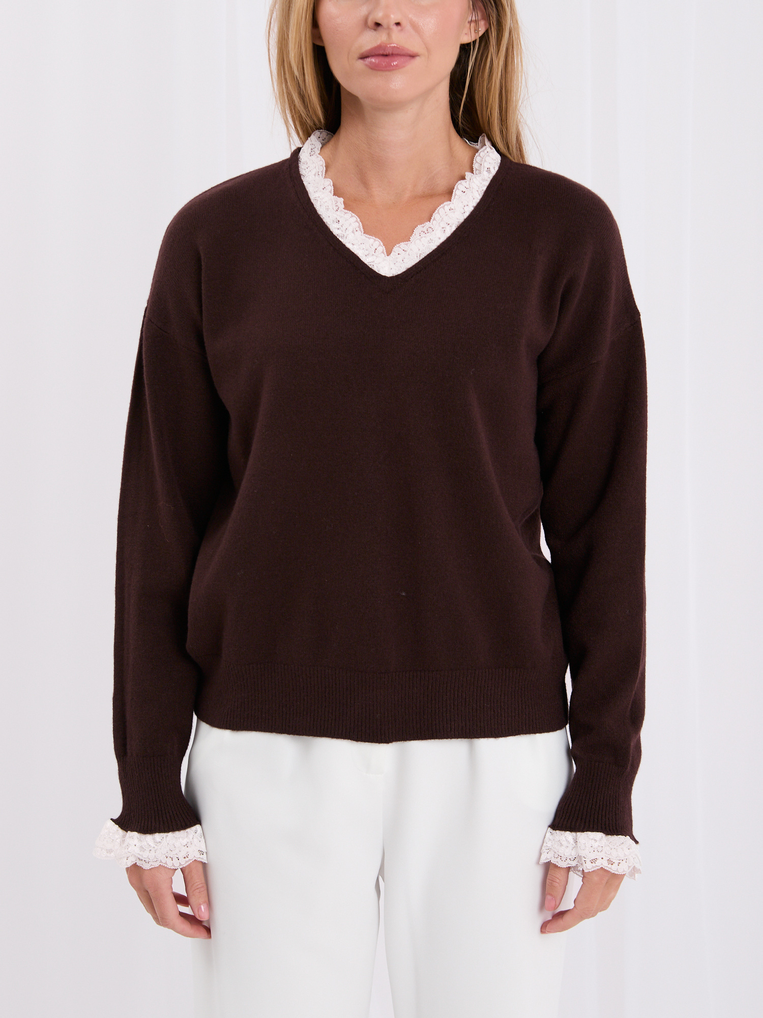 Brown women's sweater with white embroidered lace.