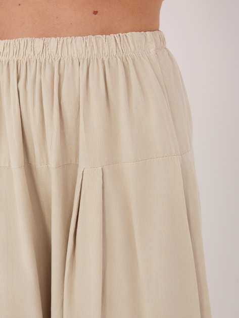 Beżowe sztruksowe spodnie z zakładkami