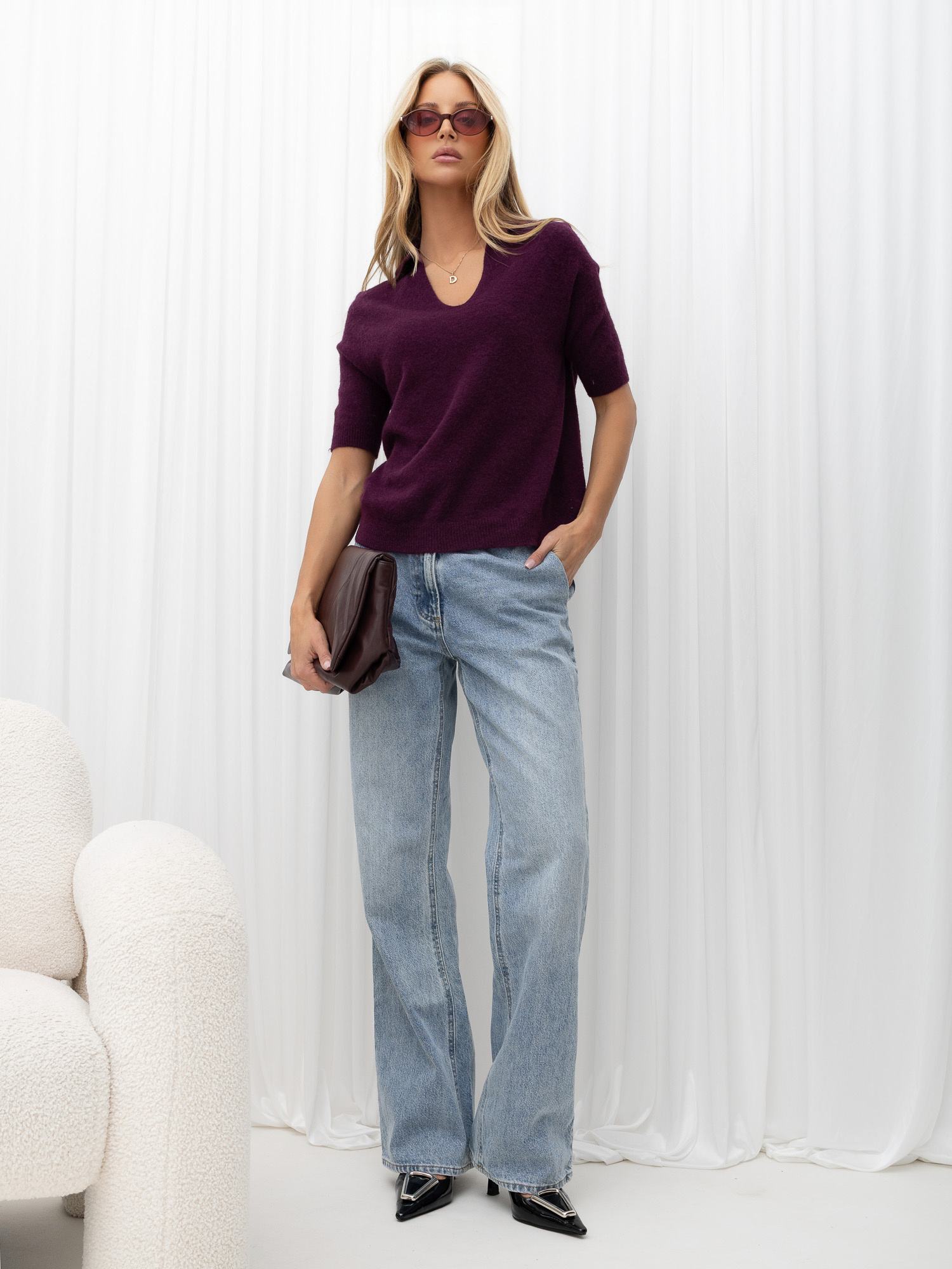 Dark purple polo sweater with a mohair effect.