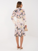 Light beige floral shirt dress.