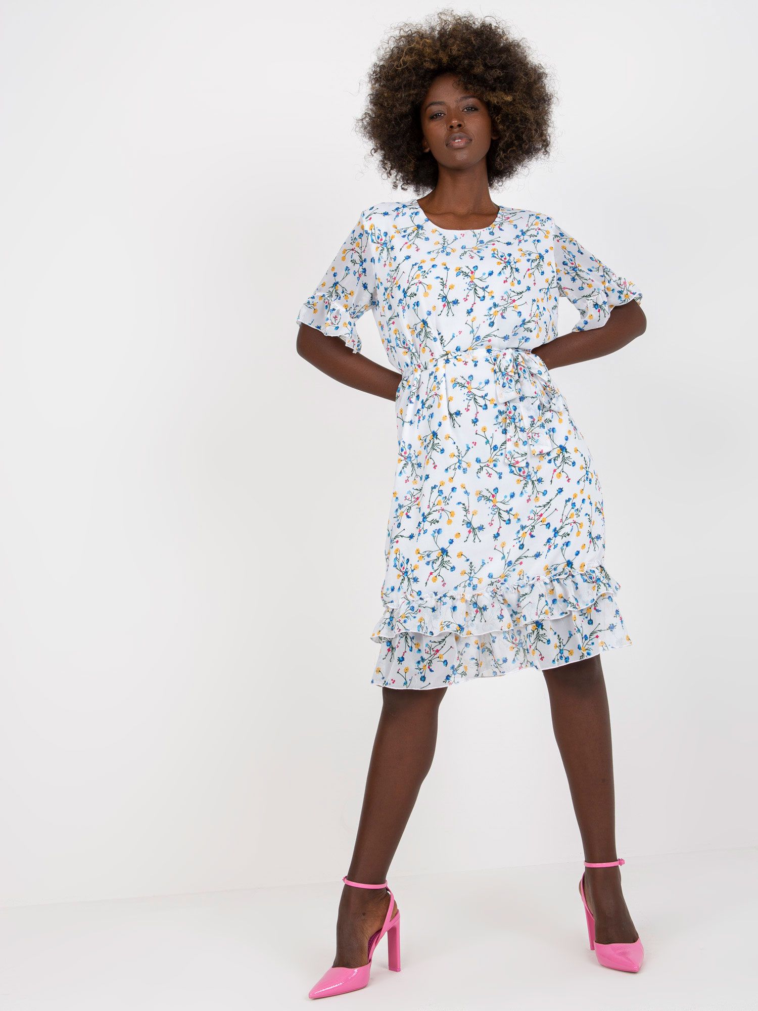 White midi dress with floral pattern and flounces